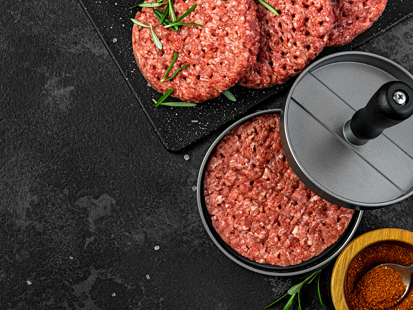 Rindfleisch Pattys mit Burger Smasher